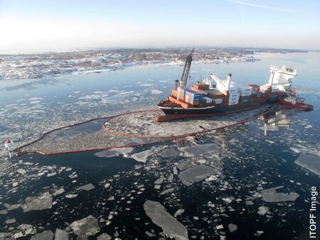 Boomed vessel in ice